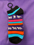 Colorful horse print sock with striped pattern on a purple background
