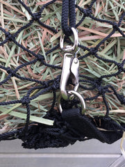 swivel snap clipped to bottom d-ring of 1.5" EcoNets hay net