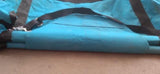 Blue trailer bag showing the flap closed and secured to the velcro with adjustable strap